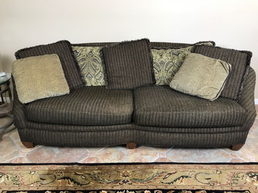 Curved Back Sofa With Throw Pillows 93'W X 45'H X 34'H [Photo 1]