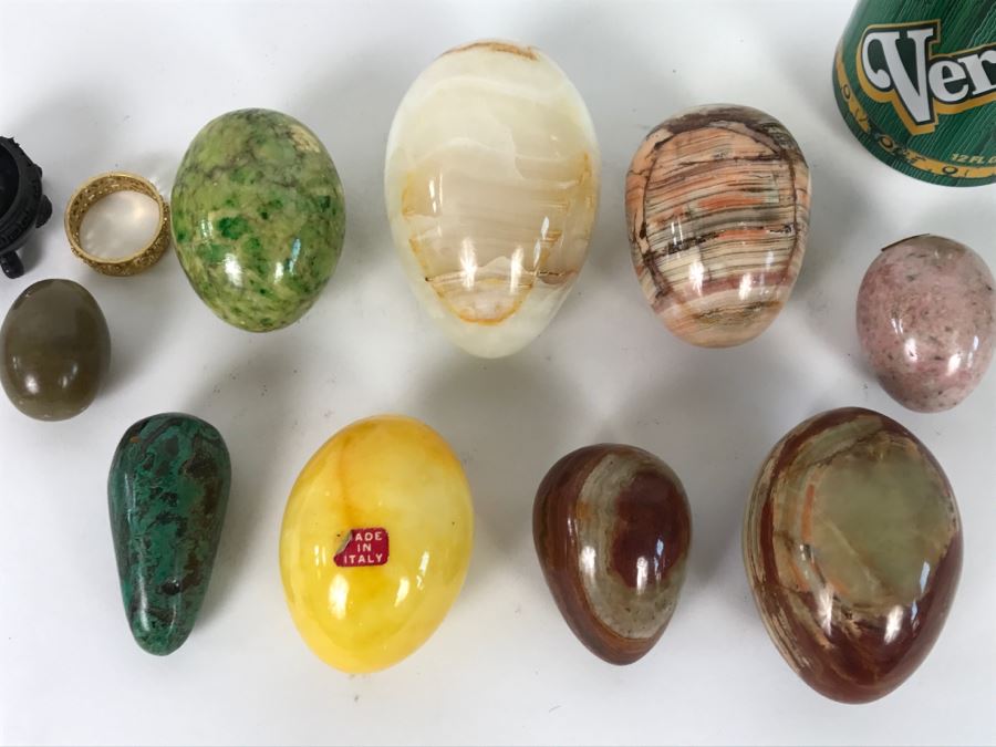 Collection Of Various Polished Stone Eggs With Several Stands