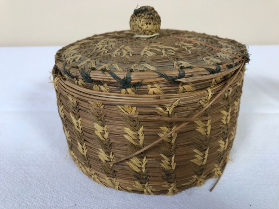 Native American Indian Basket Filled With Old Pottery Shards And Shells