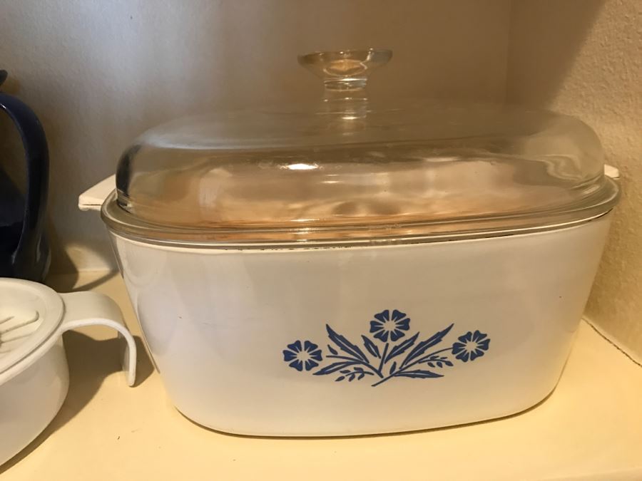 Kitchen Pantry Lot Featuring Corning Ware Covered Dish, Bundt Pan, Pacific Cermaic Blue Bowl, West Bend Crock Pot - See All Photos [Photo 3]