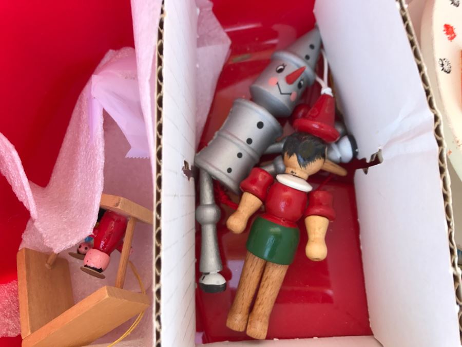 Bins Filled With Holiday Decorations Including 2-Layers Of Christmas Ornaments, Easter Decorations, Christmas Tree Stand - See All Photos [Photo 13]