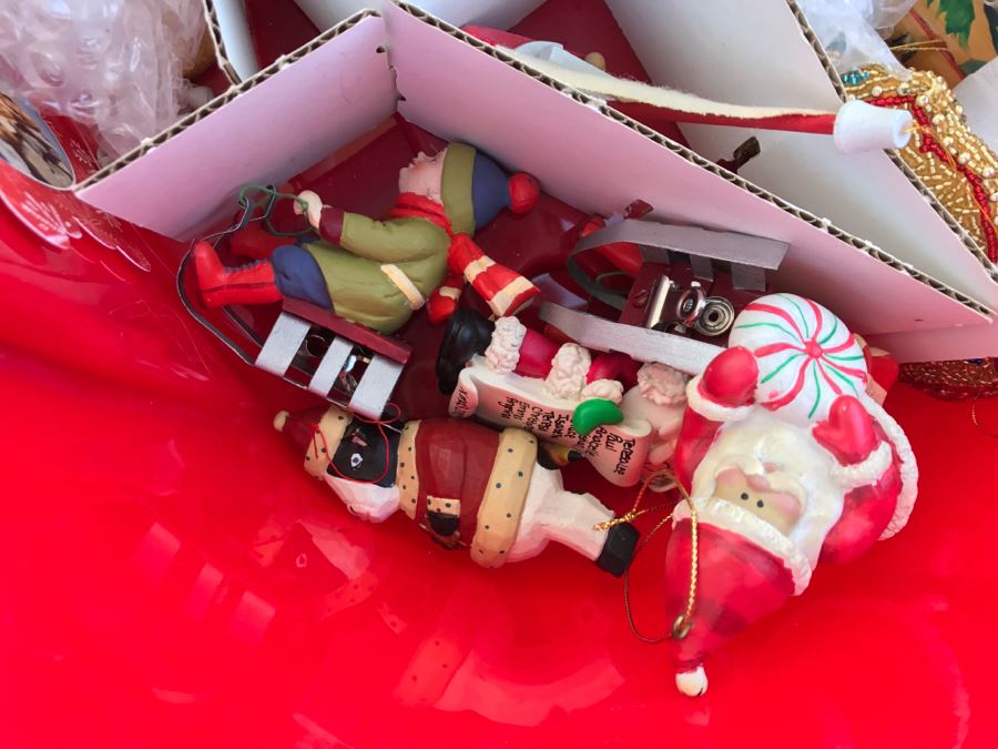 Bins Filled With Holiday Decorations Including 2-Layers Of Christmas Ornaments, Easter Decorations, Christmas Tree Stand - See All Photos [Photo 18]