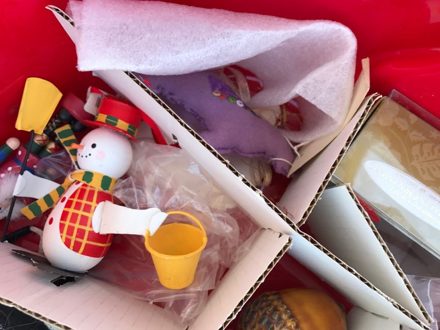 Bins Filled With Holiday Decorations Including 2-Layers Of Christmas Ornaments, Easter Decorations, Christmas Tree Stand - See All Photos [Photo 17]