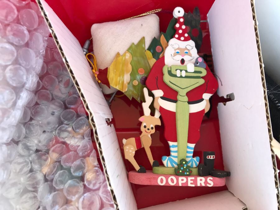 Bins Filled With Holiday Decorations Including 2-Layers Of Christmas Ornaments, Easter Decorations, Christmas Tree Stand - See All Photos [Photo 16]