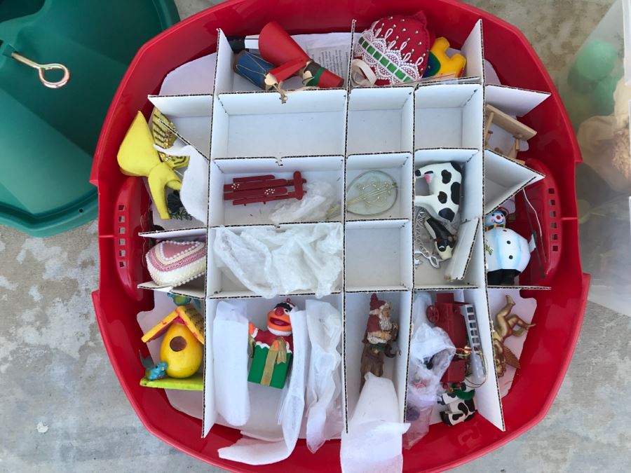 Bins Filled With Holiday Decorations Including 2-Layers Of Christmas Ornaments, Easter Decorations, Christmas Tree Stand - See All Photos [Photo 2]
