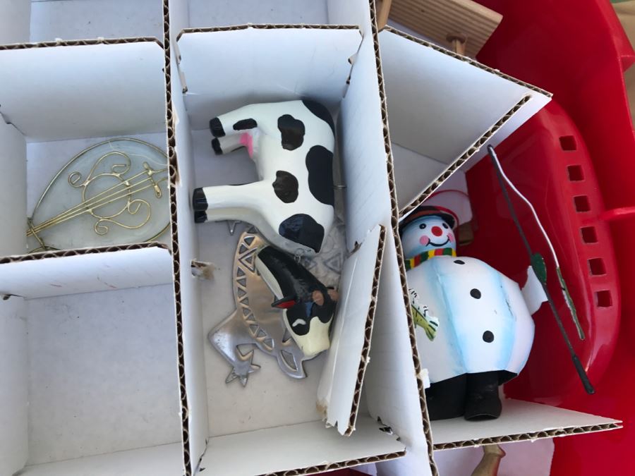 Bins Filled With Holiday Decorations Including 2-Layers Of Christmas Ornaments, Easter Decorations, Christmas Tree Stand - See All Photos [Photo 6]