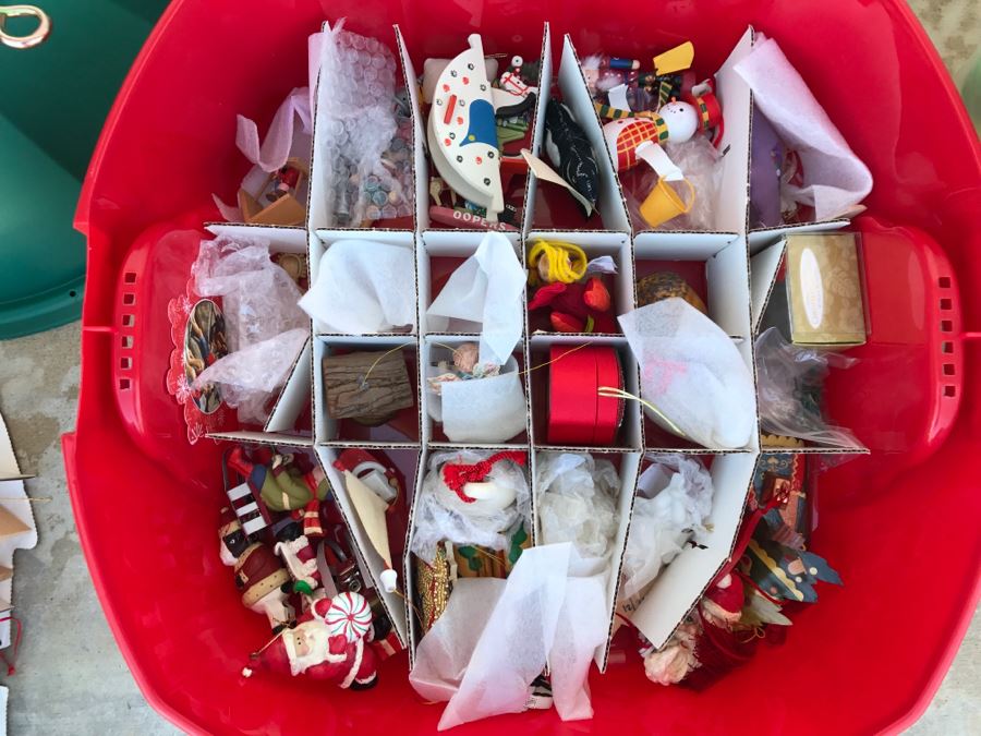 Bins Filled With Holiday Decorations Including 2-Layers Of Christmas Ornaments, Easter Decorations, Christmas Tree Stand - See All Photos [Photo 10]