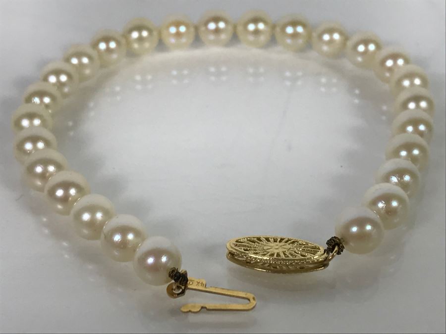 Individually Knotted Pearl Bracelet With 14K Yellow Gold Clasp [Photo 1]