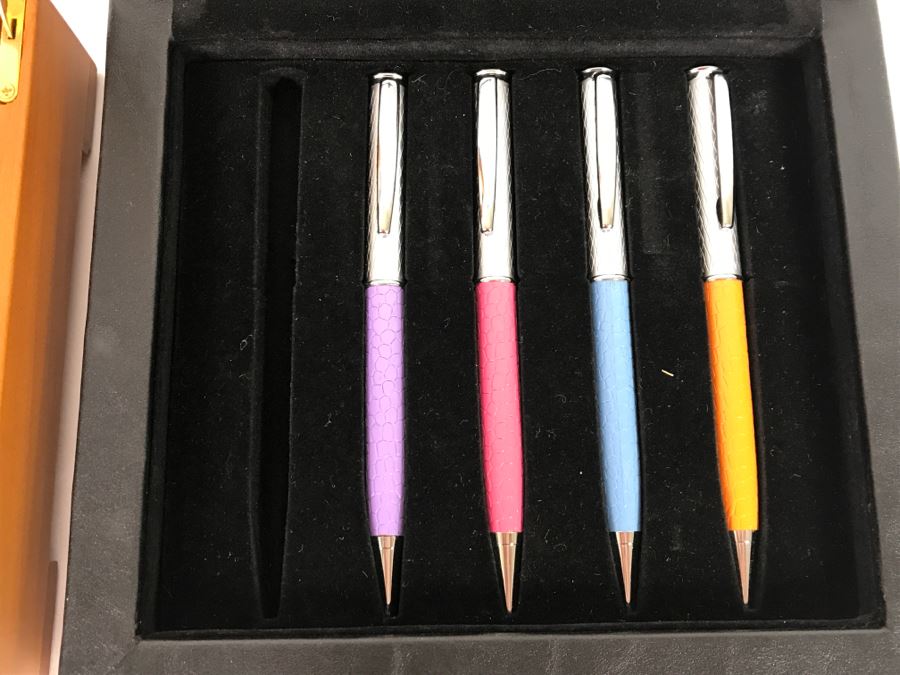 Various Ballpoint Pens With Storage Display Cases