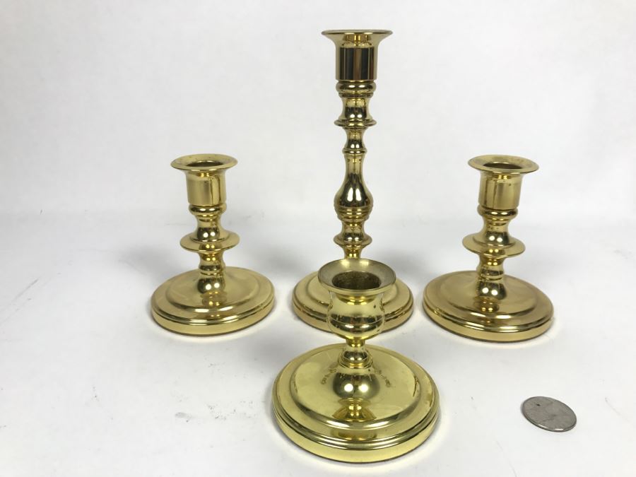 Set Of (4) Brass Baldwin Candle Holders [Photo 1]