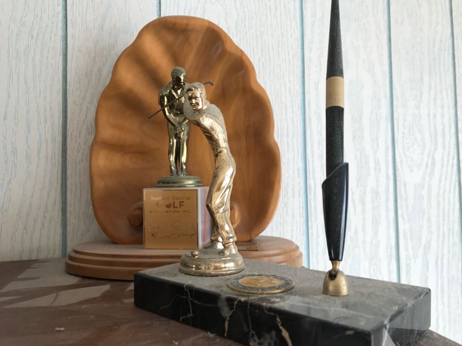 Collection Of Trophies On Top Of Cabinet [Photo 8]