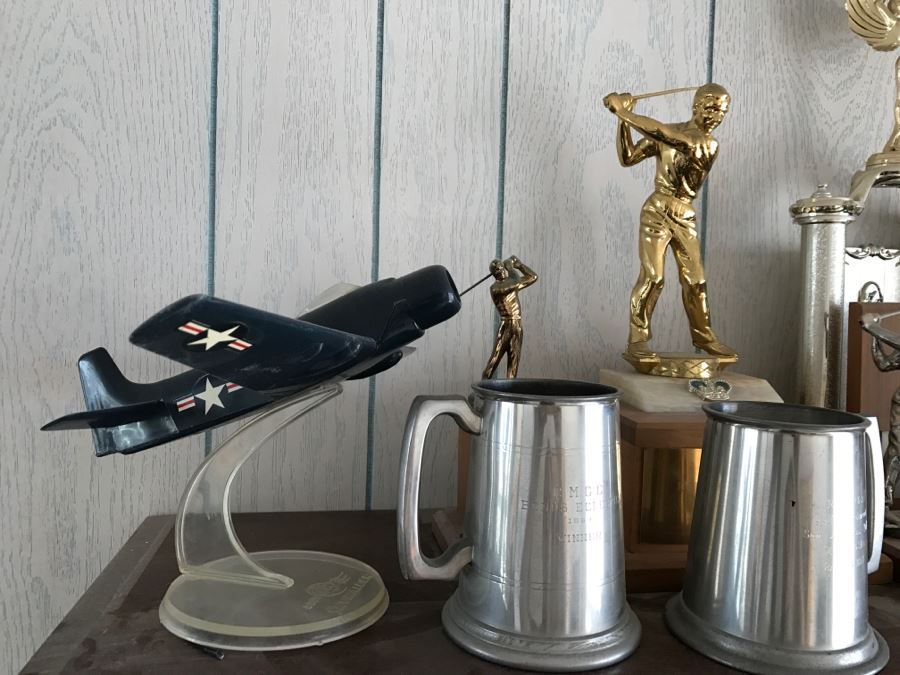 Collection Of Trophies On Top Of Cabinet [Photo 2]
