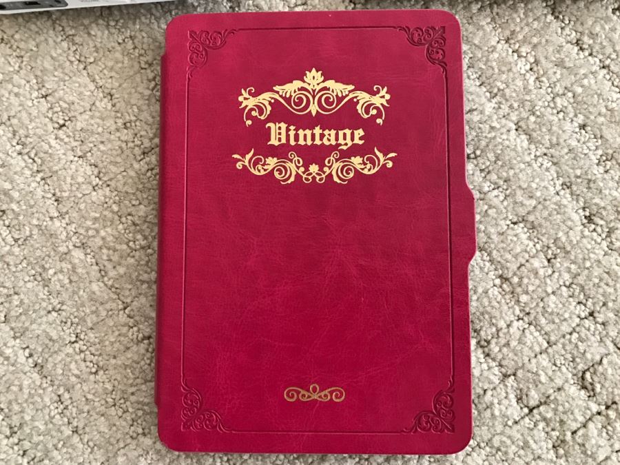 JUST ADDED - Set Of (3) Older Amazon Kindles With Vintage Kindle Case (Not Sure If Any Are Working) [Photo 9]