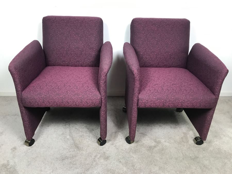 Pair Of Purple Upholstered Armchairs On Casters [Photo 1]