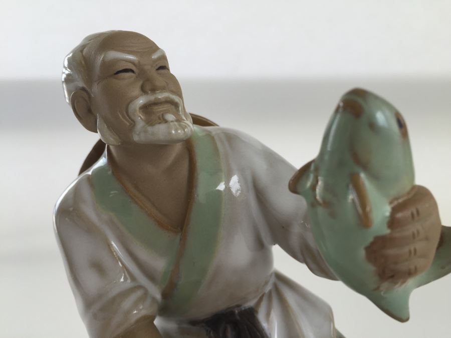 ceramic fisherman figurines