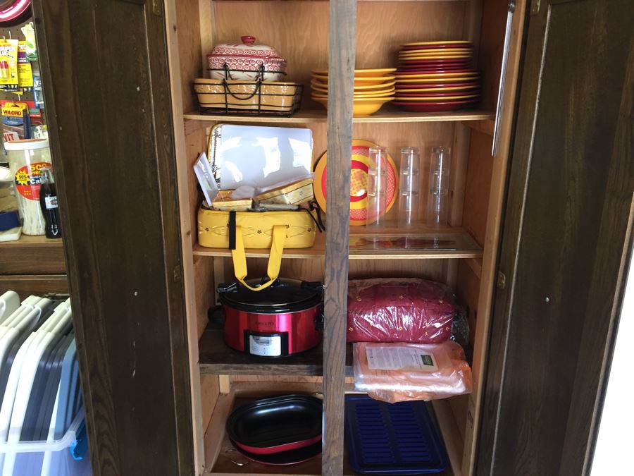 Cabinet Filled With Plates And Serving Pieces And Crock Pot - See Photos