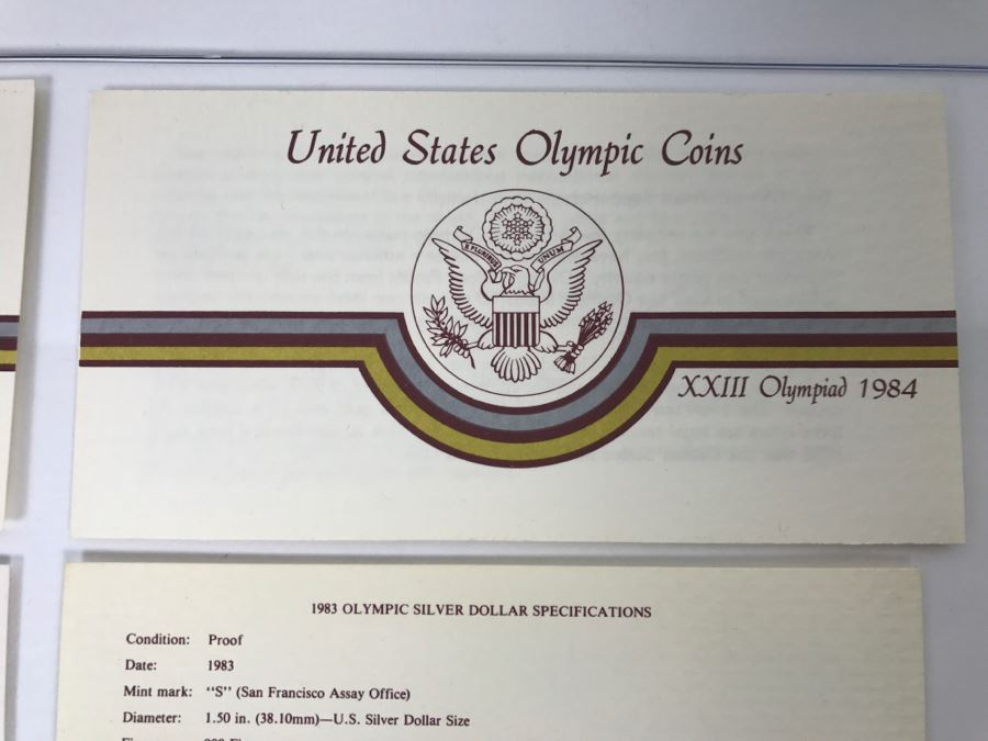 Pair Silver Coins From US 1984 Olympics [Photo 7]