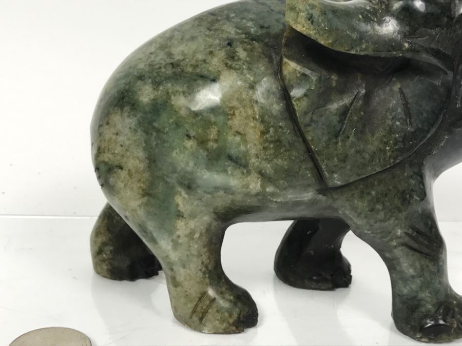 stone carved elephant figurines