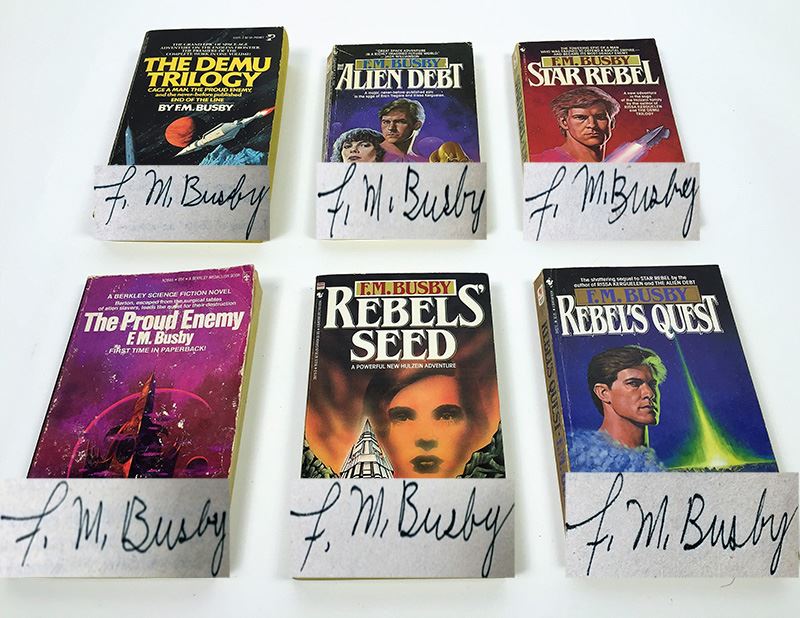 F.M. Busby Collection: The Demu Trilogy, Alien Debt, The Proud Enemy, Star Rebel, Rebel's Seed & Rebel's Quest - Signed by F.M. Busby [Photo 1]