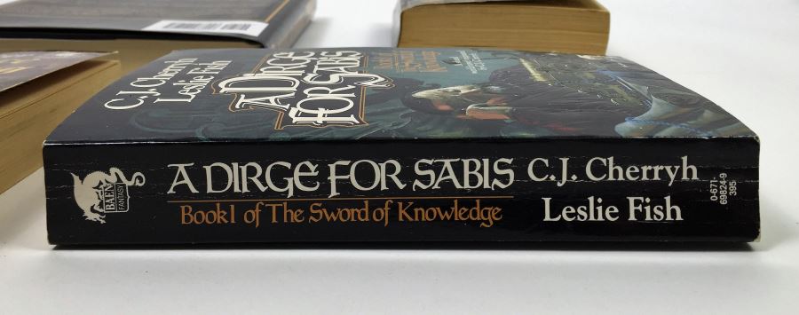 John Ringo & Julie Cochrane: Cally's War - Signed by John Ringo; The Sword of Shannara - Signed by Terry Brooks; Vengeance of the Dancing Gods - Signed by Jack L. Chalker; A Dirge for Sabis - Signed by C.J. Cherryh & Leslie Fish [Photo 23]