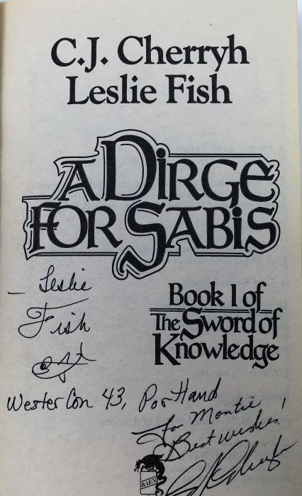 John Ringo & Julie Cochrane: Cally's War - Signed by John Ringo; The Sword of Shannara - Signed by Terry Brooks; Vengeance of the Dancing Gods - Signed by Jack L. Chalker; A Dirge for Sabis - Signed by C.J. Cherryh & Leslie Fish [Photo 25]