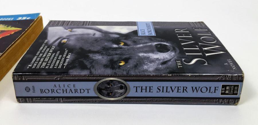 Sioux Spaceman/And Then the Town Took Off; Signed: Phoenix Without Ashes - Edward Bryant & Harlan Ellison; The Silver Wolf - Alice Borchardt; robots & changelings - Lester del Rey; The Year of the Quiet Sun - Wilson Tucker & Time Tours - William F. Wu  [Photo 19]