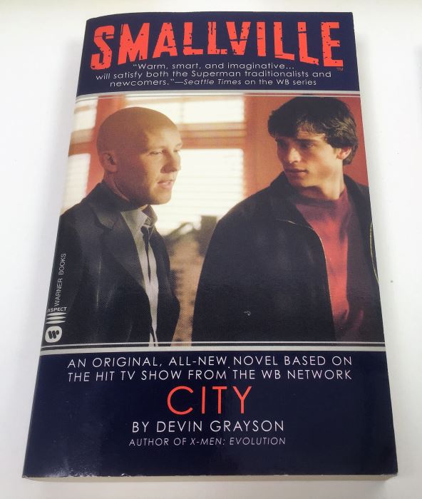 Dome - Signed by Steve Perry & Michael Reeves; The Trinity Paradox - Signed by Doug Beason & Kevin J. Anderson; The Fugitive Worlds by Bob Shaw; Smallville (x2) - Signed by Devin Grayson (x2) [Photo 5]