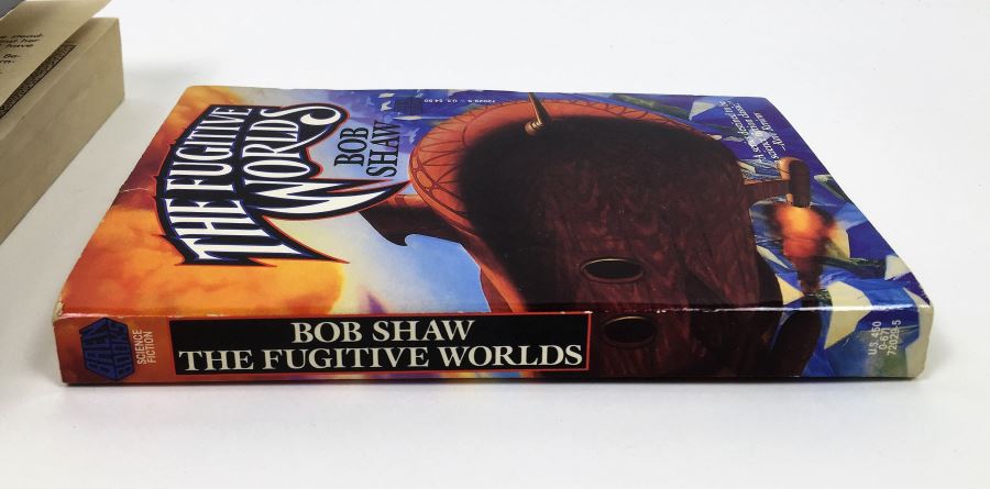 Dome - Signed by Steve Perry & Michael Reeves; The Trinity Paradox - Signed by Doug Beason & Kevin J. Anderson; The Fugitive Worlds by Bob Shaw; Smallville (x2) - Signed by Devin Grayson (x2) [Photo 16]