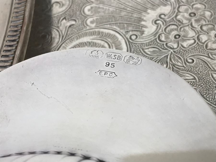 Collection Of Silverplate Serving Pieces Including Large Ornate Chased Tray, Gravy Train, Covered Butter Dishes And Shell Tray [Photo 8]