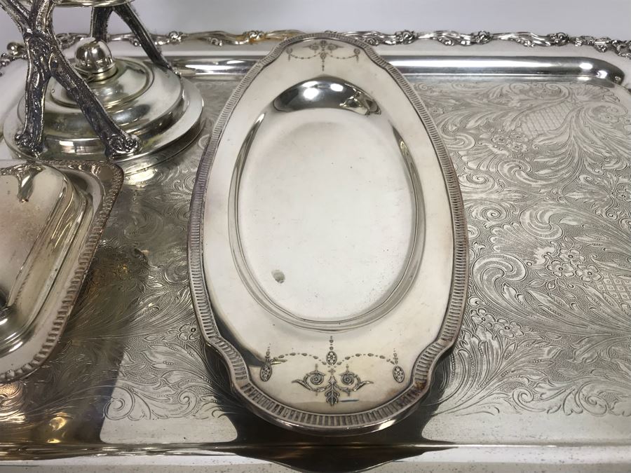 Collection Of Silverplate Serving Pieces Including Large Ornate Chased Tray, Gravy Train, Covered Butter Dishes And Shell Tray [Photo 11]