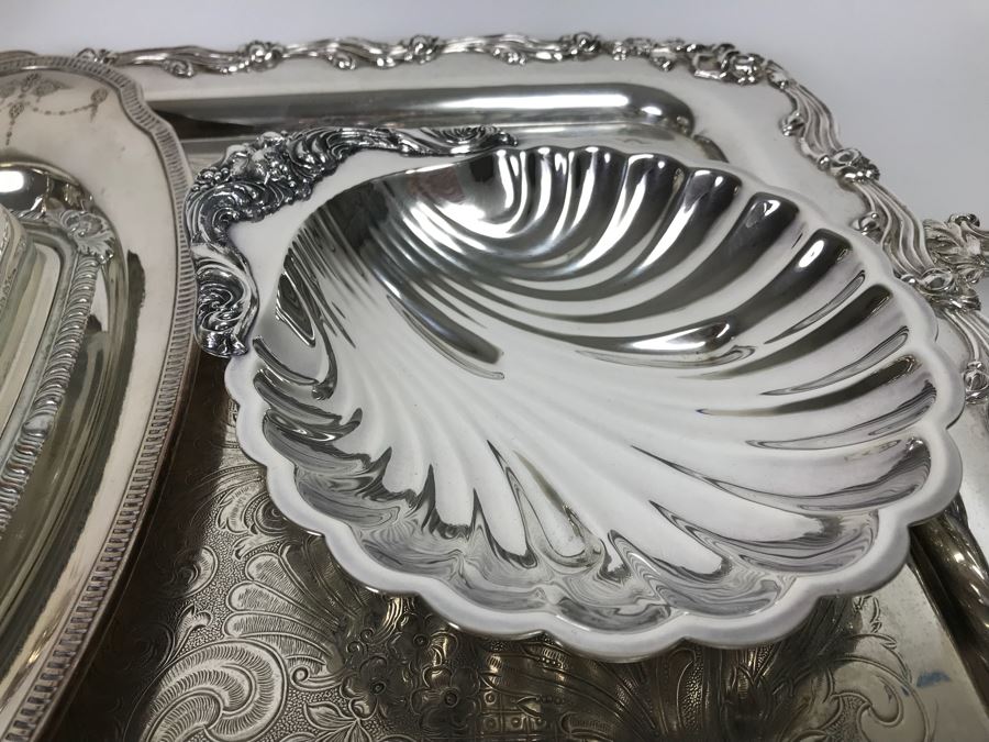Collection Of Silverplate Serving Pieces Including Large Ornate Chased Tray, Gravy Train, Covered Butter Dishes And Shell Tray [Photo 7]
