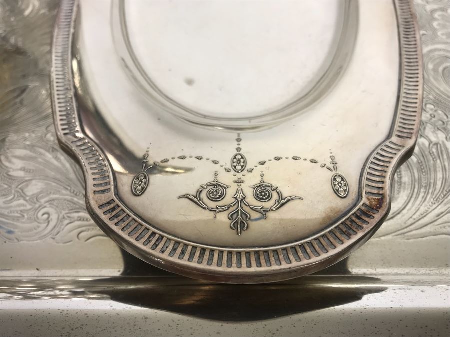 Collection Of Silverplate Serving Pieces Including Large Ornate Chased Tray, Gravy Train, Covered Butter Dishes And Shell Tray [Photo 12]