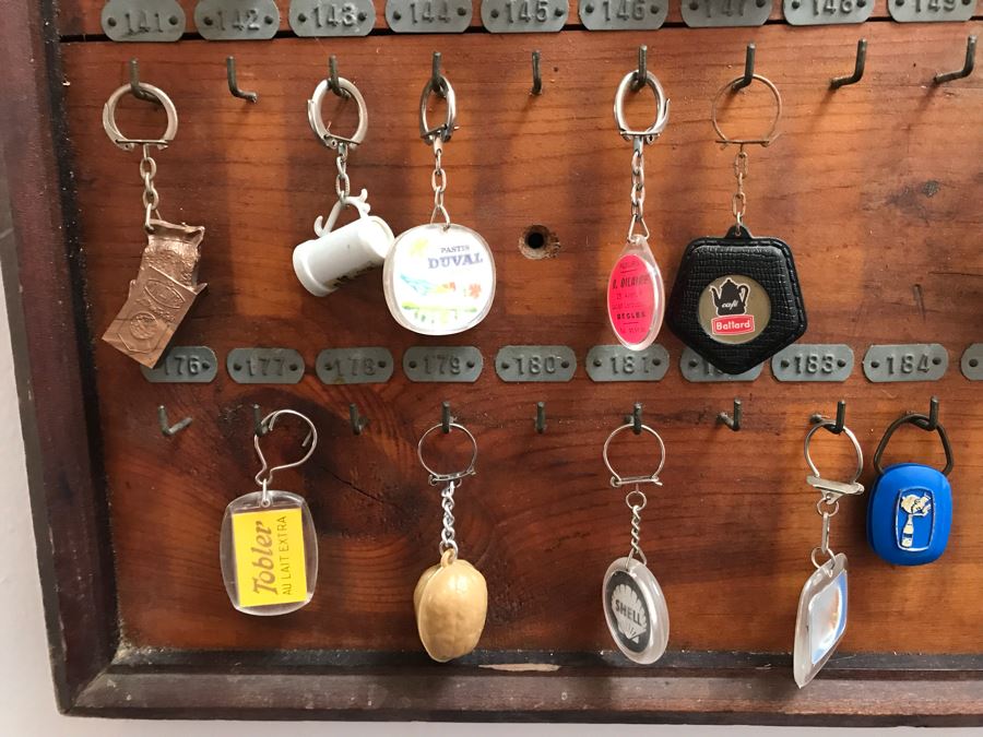 Vintage Wall Mounted Wooden Key Rack With Metal Numbered Name Tags Filled With 90 Vintage Keychains ($450 Retail Value In Keychains Alone) 47'W x 29'H [Photo 10]