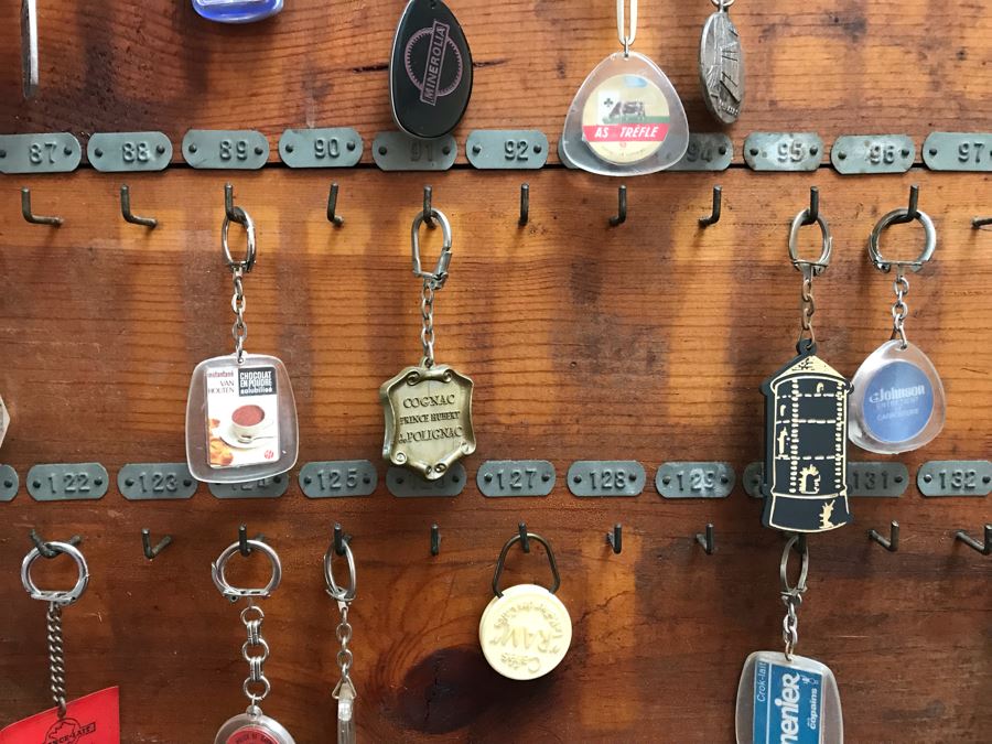 Vintage Wall Mounted Wooden Key Rack With Metal Numbered Name Tags Filled With 90 Vintage Keychains ($450 Retail Value In Keychains Alone) 47'W x 29'H [Photo 15]