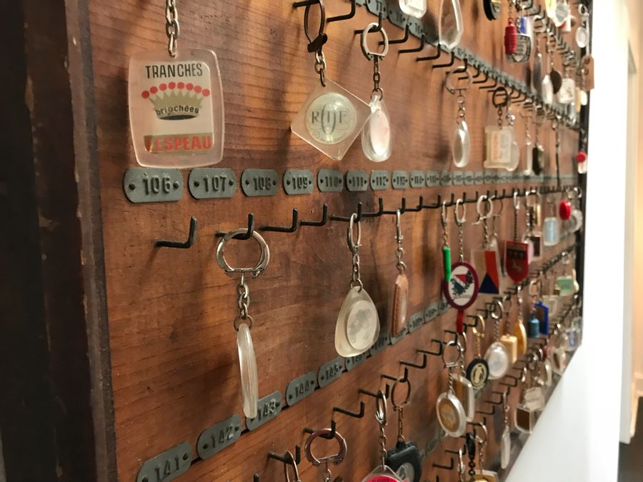 Vintage Wall Mounted Wooden Key Rack With Metal Numbered Name Tags Filled With 90 Vintage Keychains ($450 Retail Value In Keychains Alone) 47'W x 29'H [Photo 22]