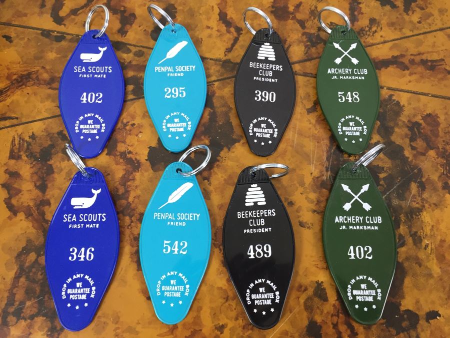 JUST ADDED - Pair Of Notepads With Clipboards, Silverplate Trophy Bowl Filled With Motel Keychains And Questionable Merit Badge Patches [Photo 9]