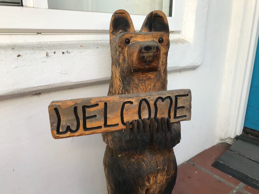 Wooden Carved Bear Statue That Holds Sign Reading 'Welcome' On One Side, 'Go Away' On Other [Photo 3]