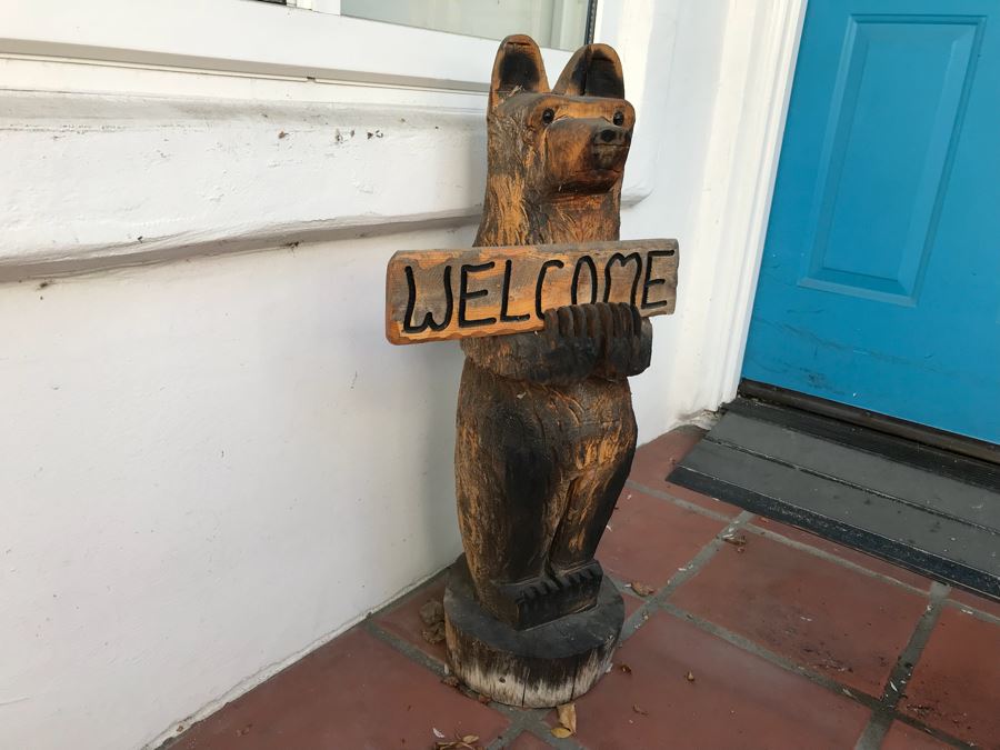 Wooden Carved Bear Statue That Holds Sign Reading 'Welcome' On One Side, 'Go Away' On Other [Photo 2]