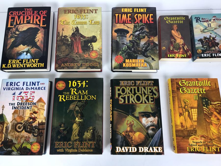 (7) First Printing Hardcover Books And (2) Paperback Books By Eric Flint