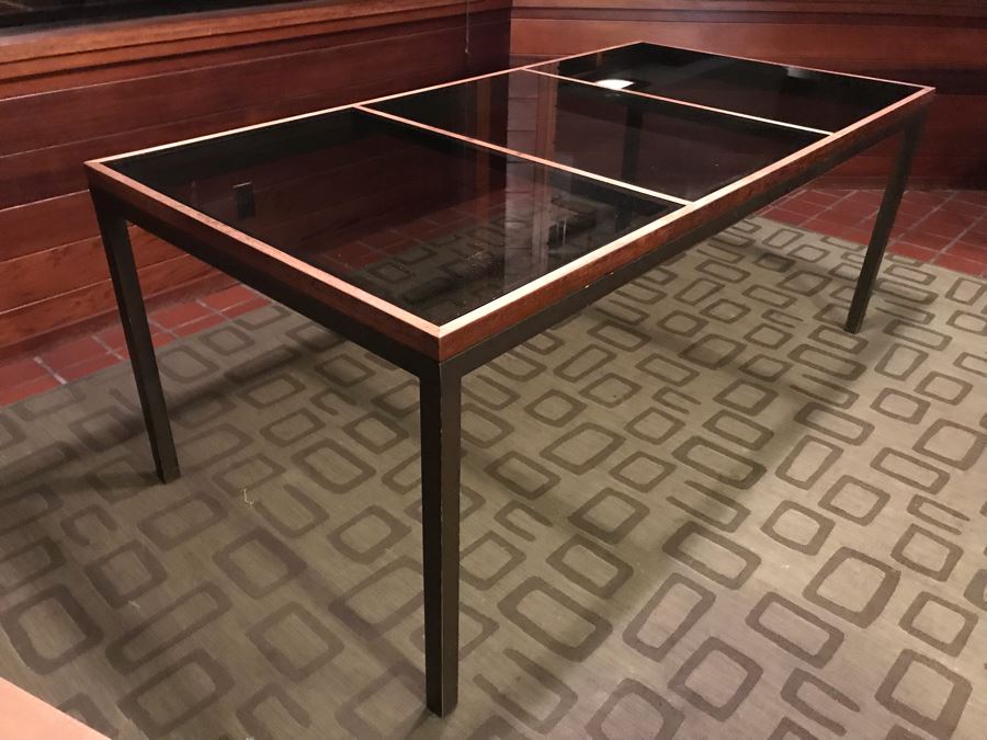 Modernist Dining Table Constructed Of Wooden Sides Metal Legs And A 3-Panel Glass Top [Photo 3]