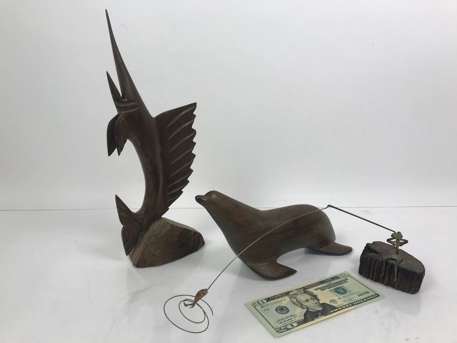 Carved Ironwood Sailfish And Seal Plus Metal Fisherman Sculpture