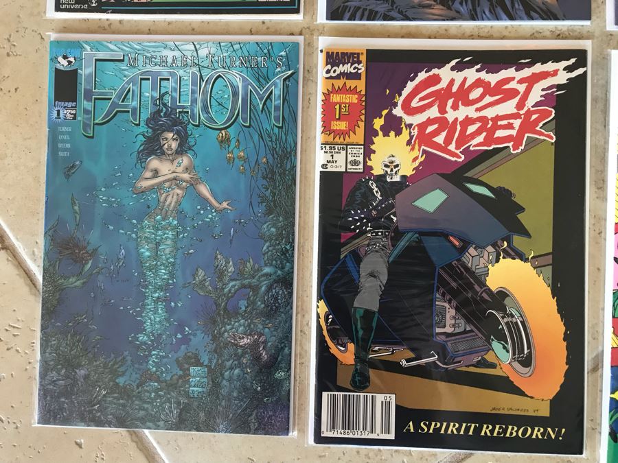 (10) Vintage Comic Books Including Fathom #1, Ghost Rider #1, Earth X #1, Elongated Man #1, The Rampaging Hulk #1, Tomb Raider #1, Peter Parker Spider-Man #1 [Photo 5]