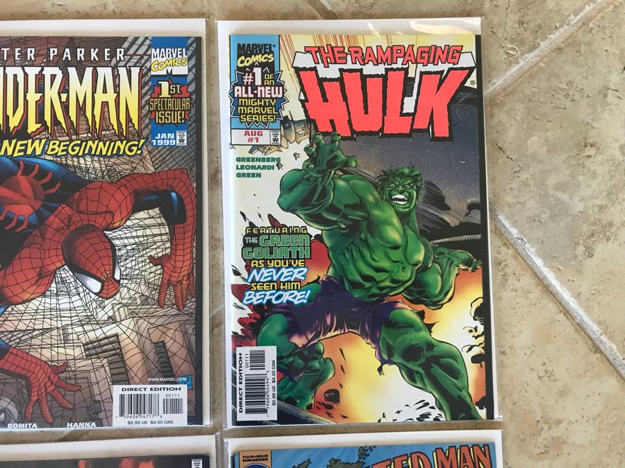 (10) Vintage Comic Books Including Fathom #1, Ghost Rider #1, Earth X #1, Elongated Man #1, The Rampaging Hulk #1, Tomb Raider #1, Peter Parker Spider-Man #1 [Photo 4]