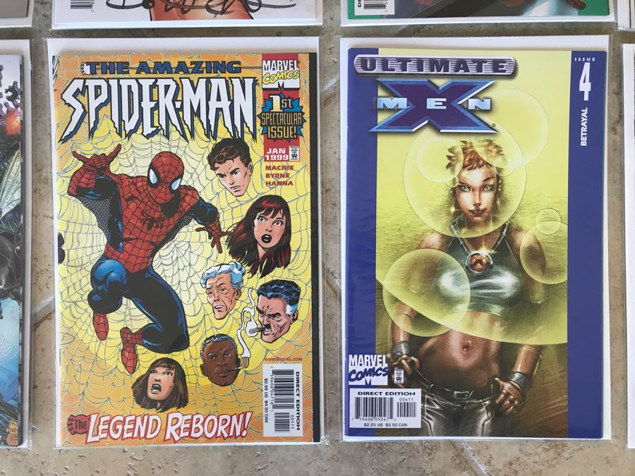 (10) Vintage Comic Books Including RoboCop #1, SIGNED Forever Amber #1, Undertaker #1, The Amazing Spider-Man #1, WildStar #1, Ant Man's Big Christmas #1 [Photo 7]