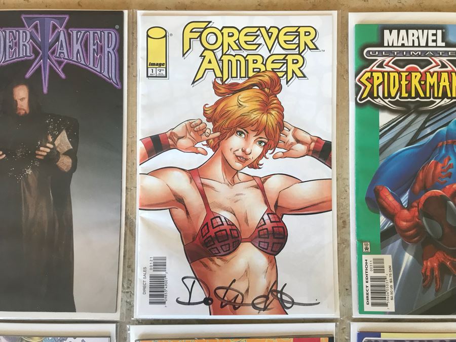 (10) Vintage Comic Books Including RoboCop #1, SIGNED Forever Amber #1, Undertaker #1, The Amazing Spider-Man #1, WildStar #1, Ant Man's Big Christmas #1 [Photo 3]