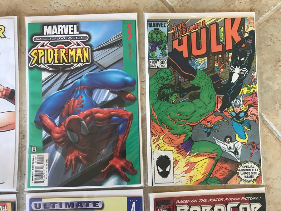 (10) Vintage Comic Books Including RoboCop #1, SIGNED Forever Amber #1, Undertaker #1, The Amazing Spider-Man #1, WildStar #1, Ant Man's Big Christmas #1 [Photo 5]