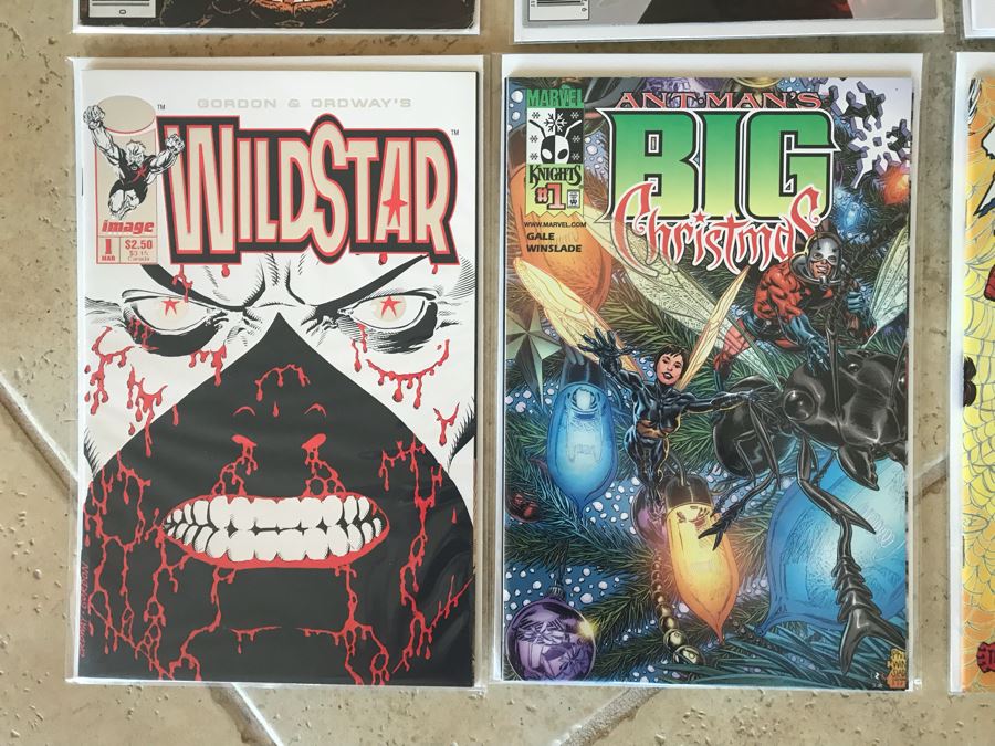 (10) Vintage Comic Books Including RoboCop #1, SIGNED Forever Amber #1, Undertaker #1, The Amazing Spider-Man #1, WildStar #1, Ant Man's Big Christmas #1 [Photo 6]