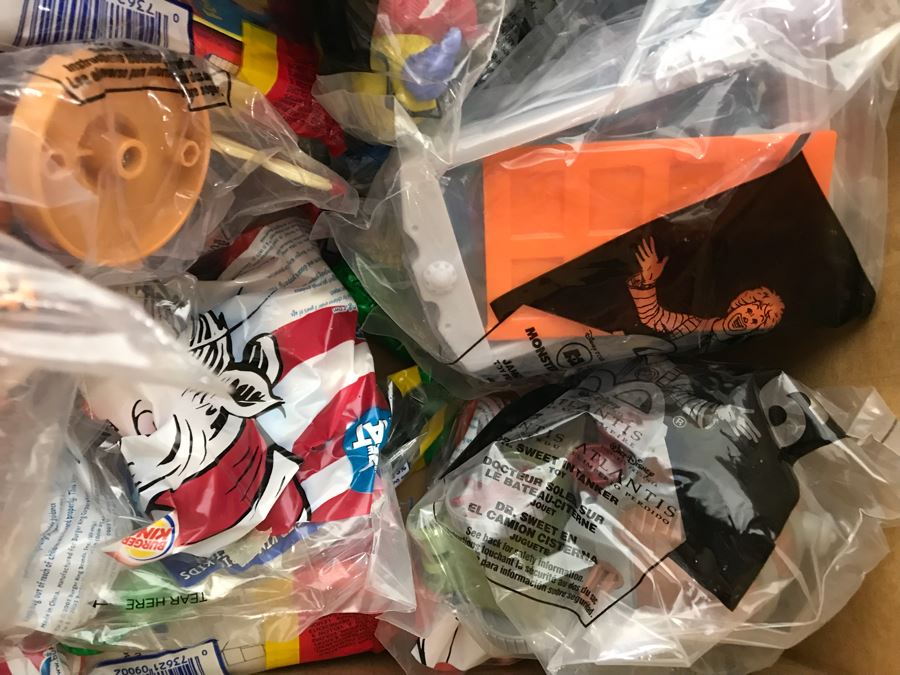 (3) Large Boxes Filled With Various McDonalds And Burger King Happy Meal Toys, Christmas Ornaments, Trading Cards Including Pokemon, PEZ Dispensers - See All Photos [Photo 48]