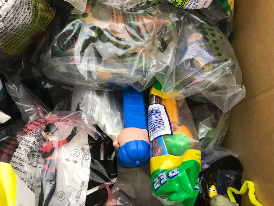 (3) Large Boxes Filled With Various McDonalds And Burger King Happy Meal Toys, Christmas Ornaments, Trading Cards Including Pokemon, PEZ Dispensers - See All Photos [Photo 55]