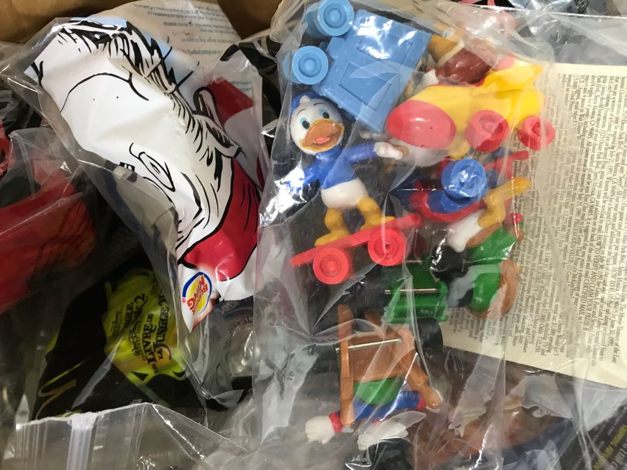 (3) Large Boxes Filled With Various McDonalds And Burger King Happy Meal Toys, Christmas Ornaments, Trading Cards Including Pokemon, PEZ Dispensers - See All Photos [Photo 41]